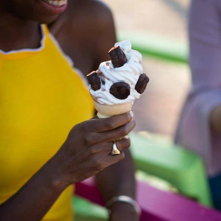 Ice cream with Rule Breaker Snacks vegan gluten-free allergen-free nut-free made with chickpeas deliciously soft-baked Brownie Bites