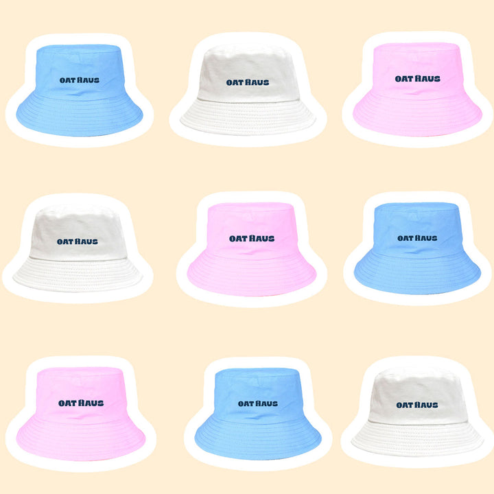 Blue, White, and Pink Oat Haus Bucket Hats